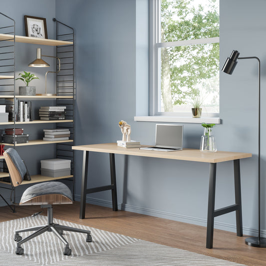 Sleek solid wood desk with two storage drawers and a pull-out keyboard tray, showcasing a dark cherry and black finish in a modern office setup
